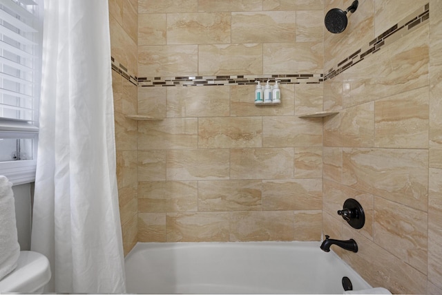bathroom with shower / bathtub combination with curtain