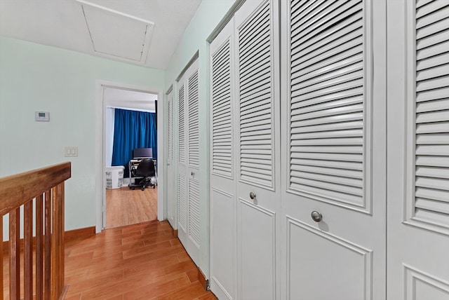 hall featuring light hardwood / wood-style floors