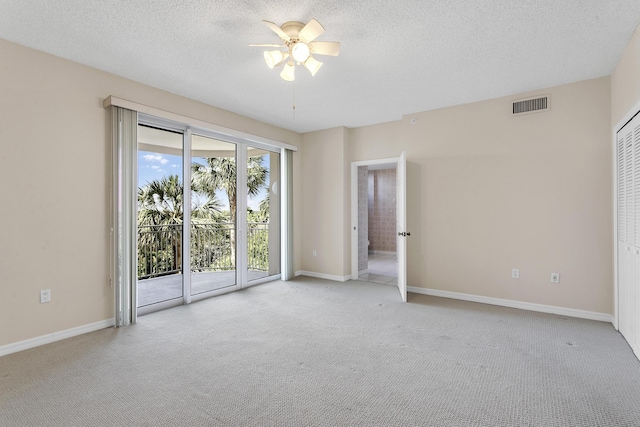 1660 S A1A Unit 222, Jupiter, FL 33477 - unfurnished room with carpet floors, ceiling fan, a textured ceiling, and baseboards