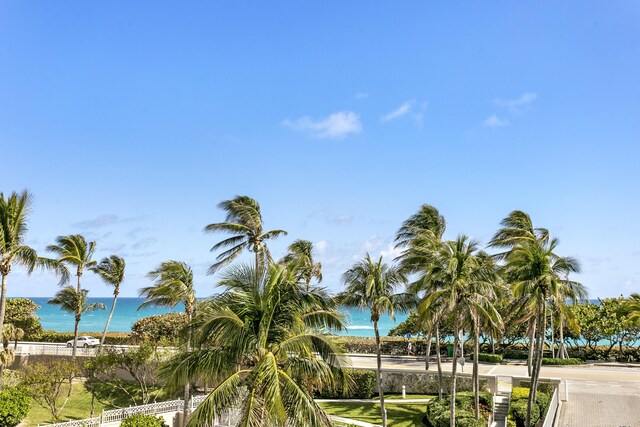 aerial view featuring a water view and a beach view