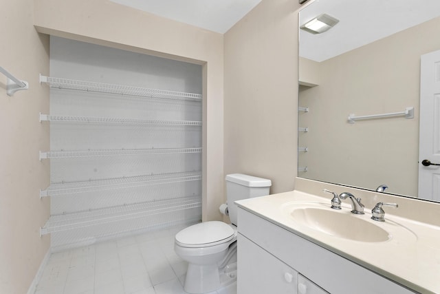 1660 S A1A Unit 222, Jupiter, FL 33477 - bathroom featuring toilet, vanity, and tile patterned floors