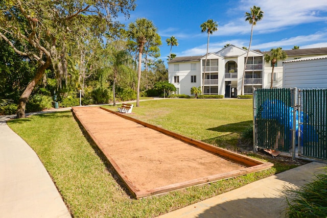 view of home's community featuring a yard