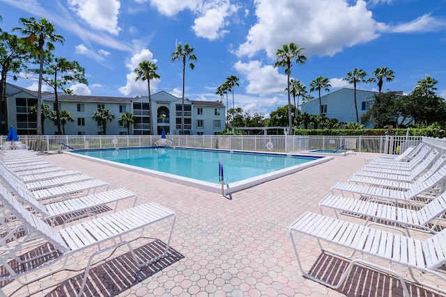 view of swimming pool featuring a patio area