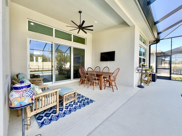 exterior space featuring ceiling fan