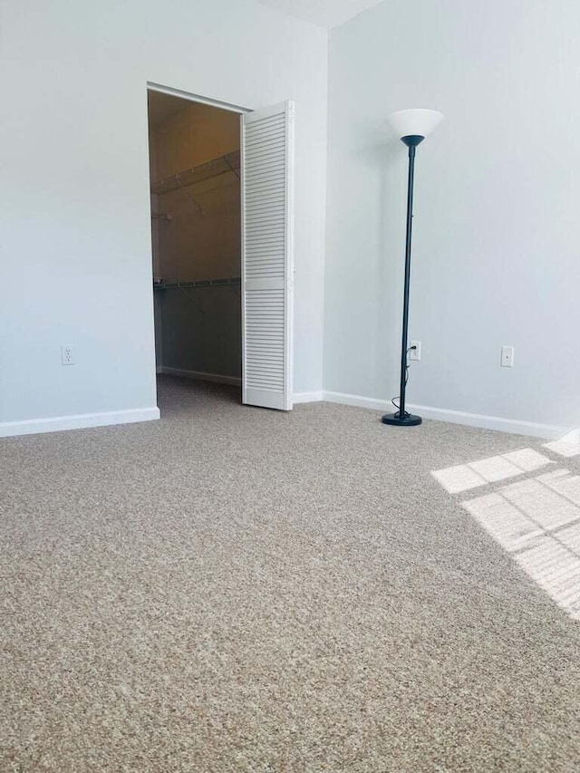 empty room featuring carpet floors