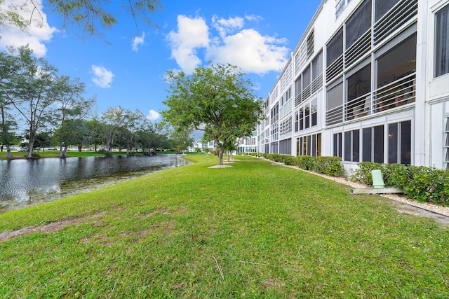 view of yard with a water view