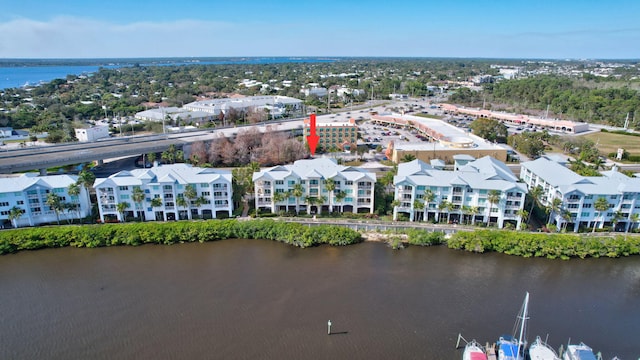 drone / aerial view with a water view