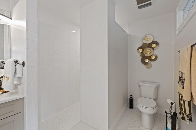 bedroom with hardwood / wood-style floors, ornamental molding, and two closets