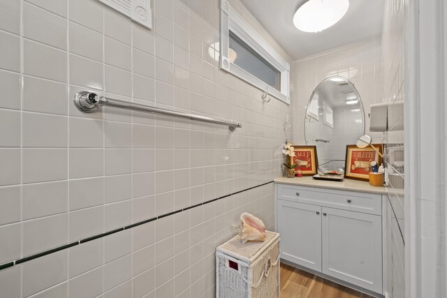 kitchen featuring light tile patterned flooring, appliances with stainless steel finishes, gray cabinetry, and backsplash