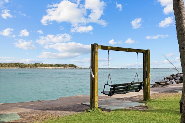 dock area with a water view