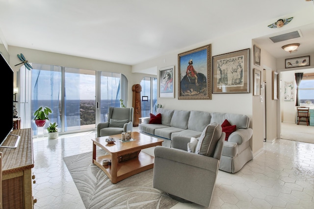 living room featuring light tile patterned flooring