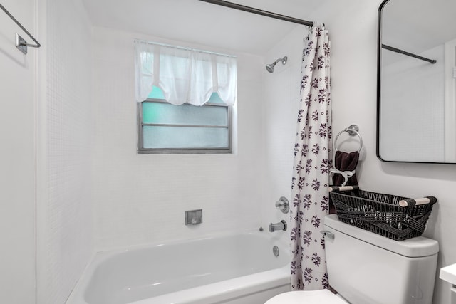 bathroom featuring toilet and shower / tub combo