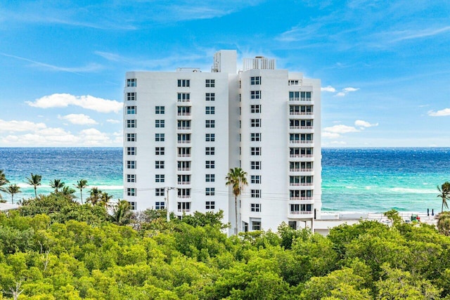 view of building exterior featuring a water view