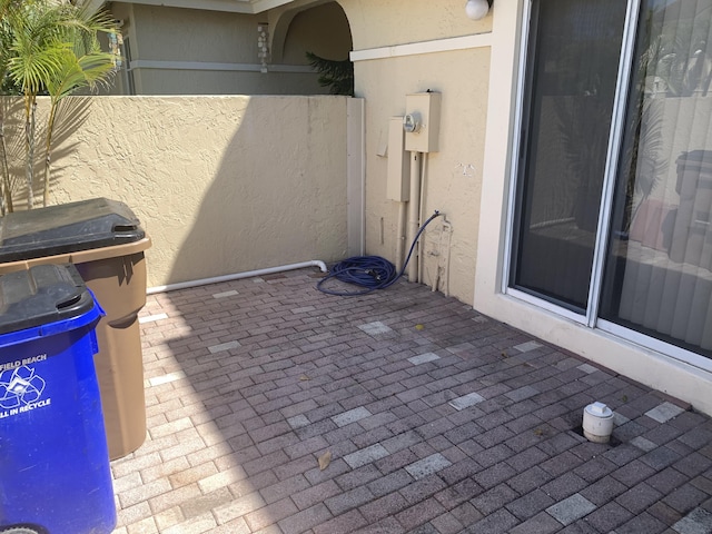 view of patio / terrace featuring fence