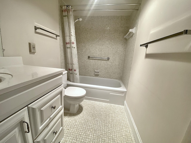 full bathroom with vanity, tile patterned floors, toilet, and shower / bath combo