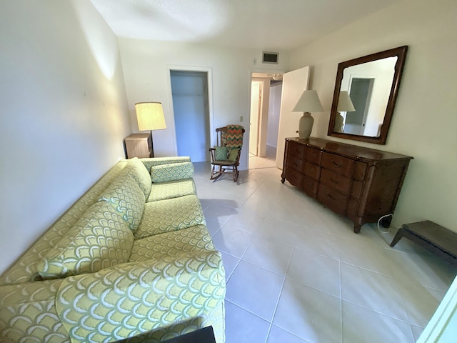 living area featuring light tile patterned flooring