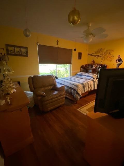 bedroom featuring hardwood / wood-style flooring