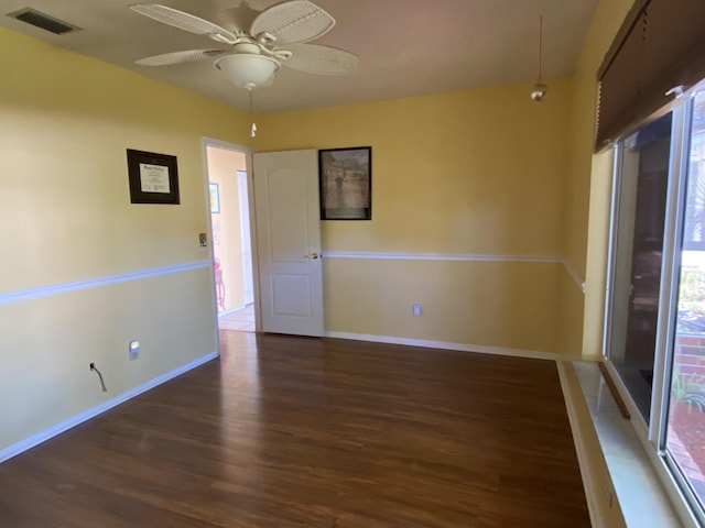 2086 SE Bisbee St, Port Saint Lucie, FL 34952 - spare room featuring visible vents, baseboards, ceiling fan, and wood finished floors