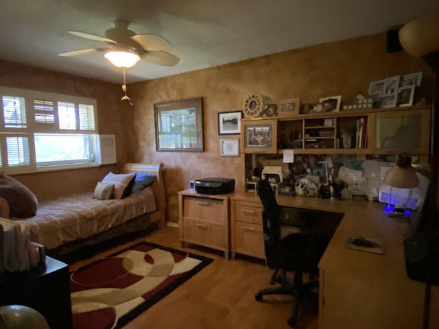 bedroom featuring light wood-style flooring