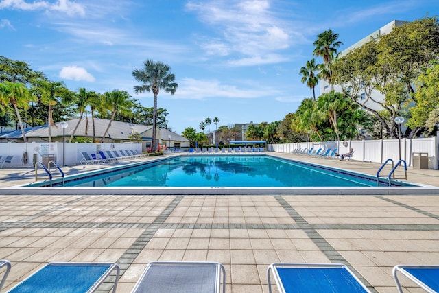 view of swimming pool featuring a patio