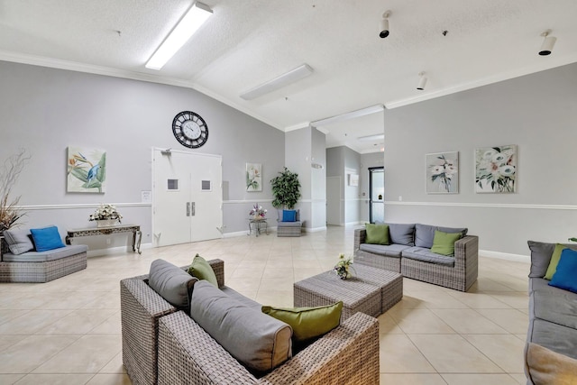 living room featuring vaulted ceiling, ornamental molding, light tile patterned floors, and a textured ceiling