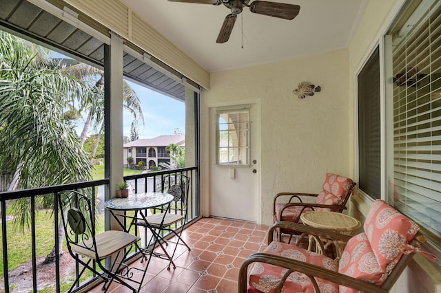 balcony featuring ceiling fan