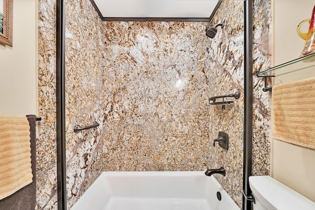 bathroom with crown molding and toilet