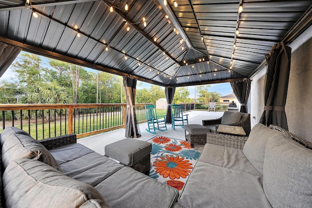 view of patio featuring a gazebo and outdoor lounge area