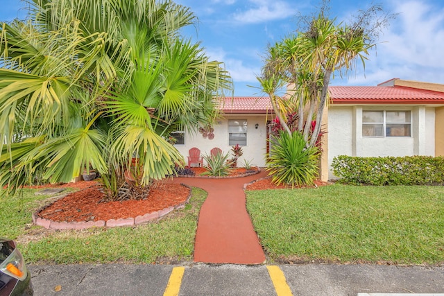 view of front of house featuring a front yard