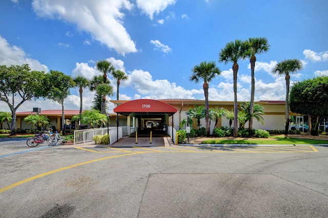 view of property with uncovered parking