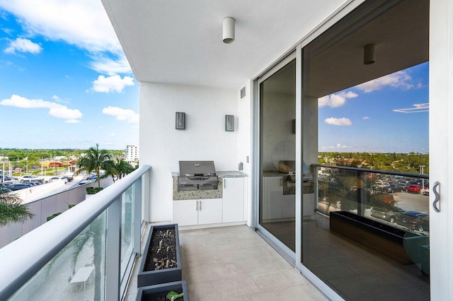 balcony featuring a grill