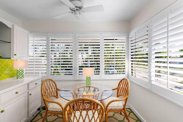 dining area with ceiling fan