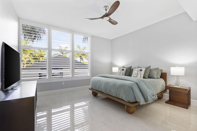 bedroom featuring ceiling fan