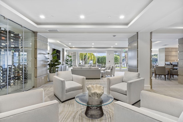 living room with a raised ceiling