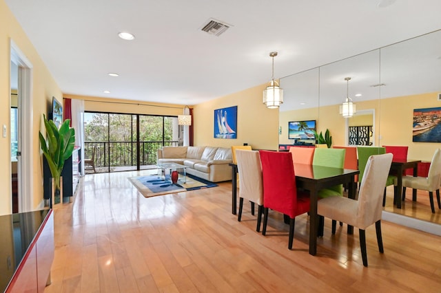 dining room featuring light hardwood / wood-style flooring