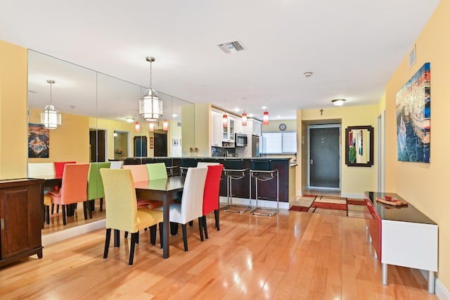 dining area featuring light hardwood / wood-style floors