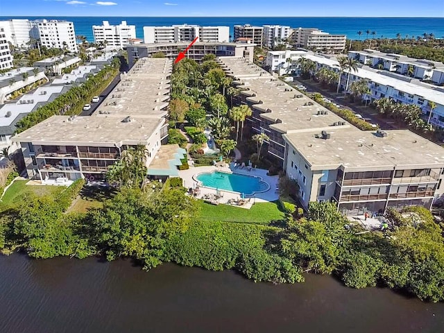 birds eye view of property featuring a water view