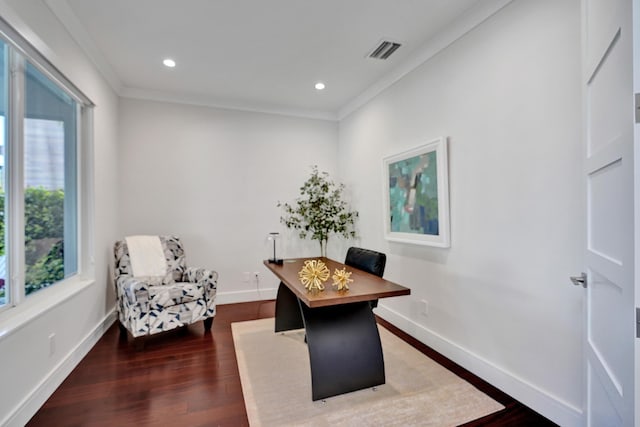 home office featuring ornamental molding and dark hardwood / wood-style floors