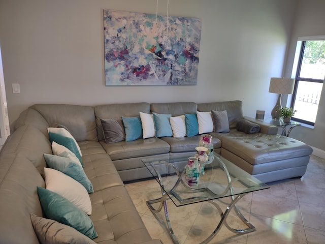 living room with light tile patterned flooring