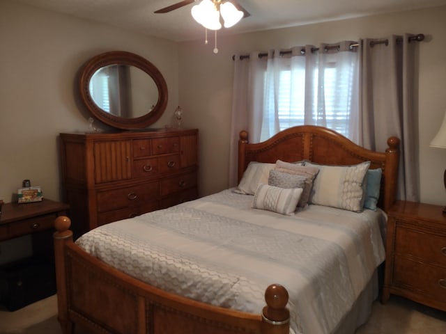 bedroom featuring ceiling fan