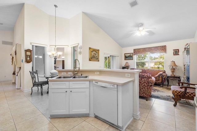 kitchen with sink, white cabinets, white dishwasher, and decorative light fixtures