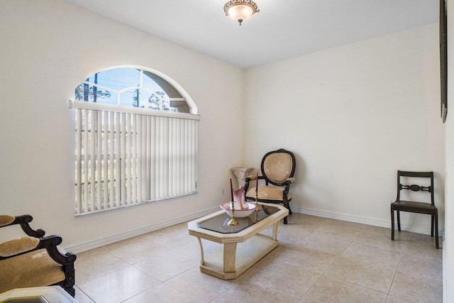 living area with light tile patterned floors