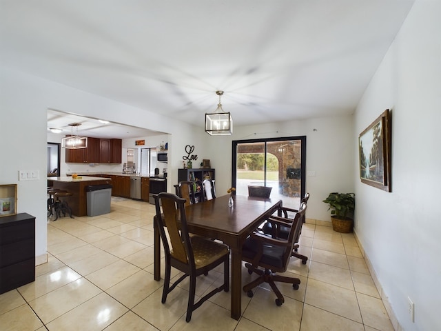 dining room featuring light tile patterned floors