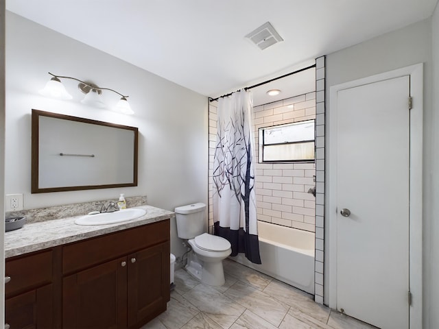 full bathroom featuring vanity, toilet, and shower / bath combo with shower curtain