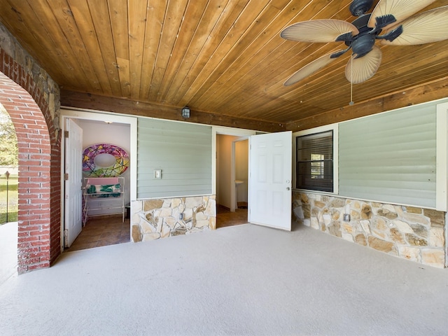 exterior space with ceiling fan