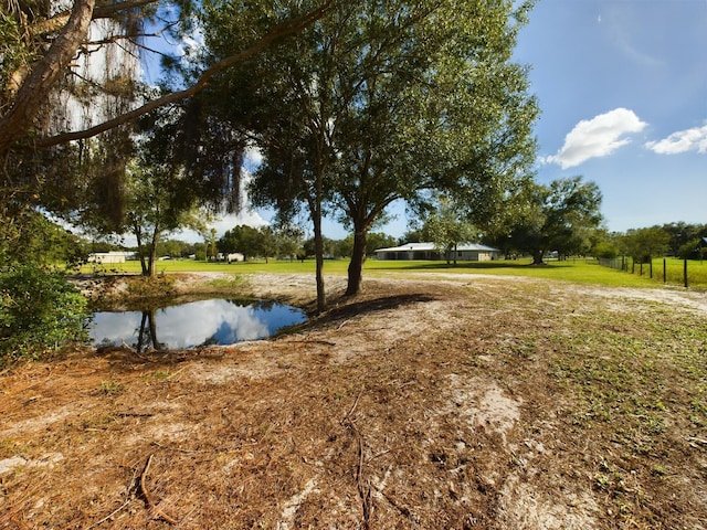 view of yard featuring a water view