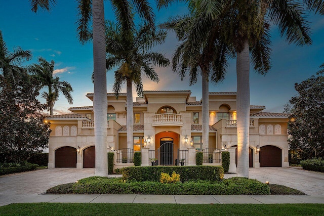 mediterranean / spanish home featuring a balcony