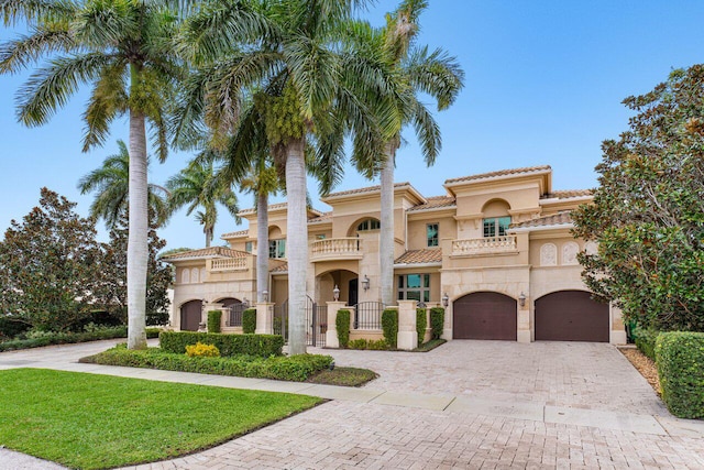 mediterranean / spanish home featuring a balcony