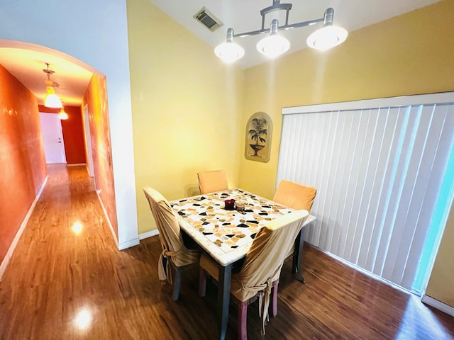 dining area with hardwood / wood-style floors