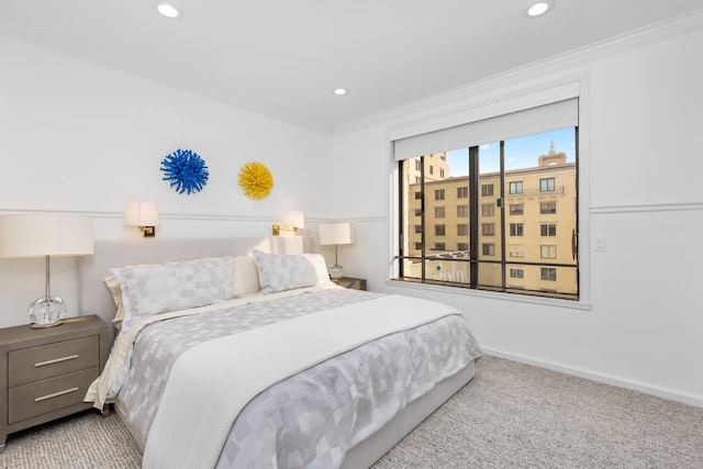 carpeted bedroom with crown molding